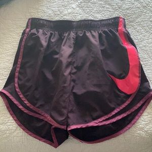 Purple Nike shorts